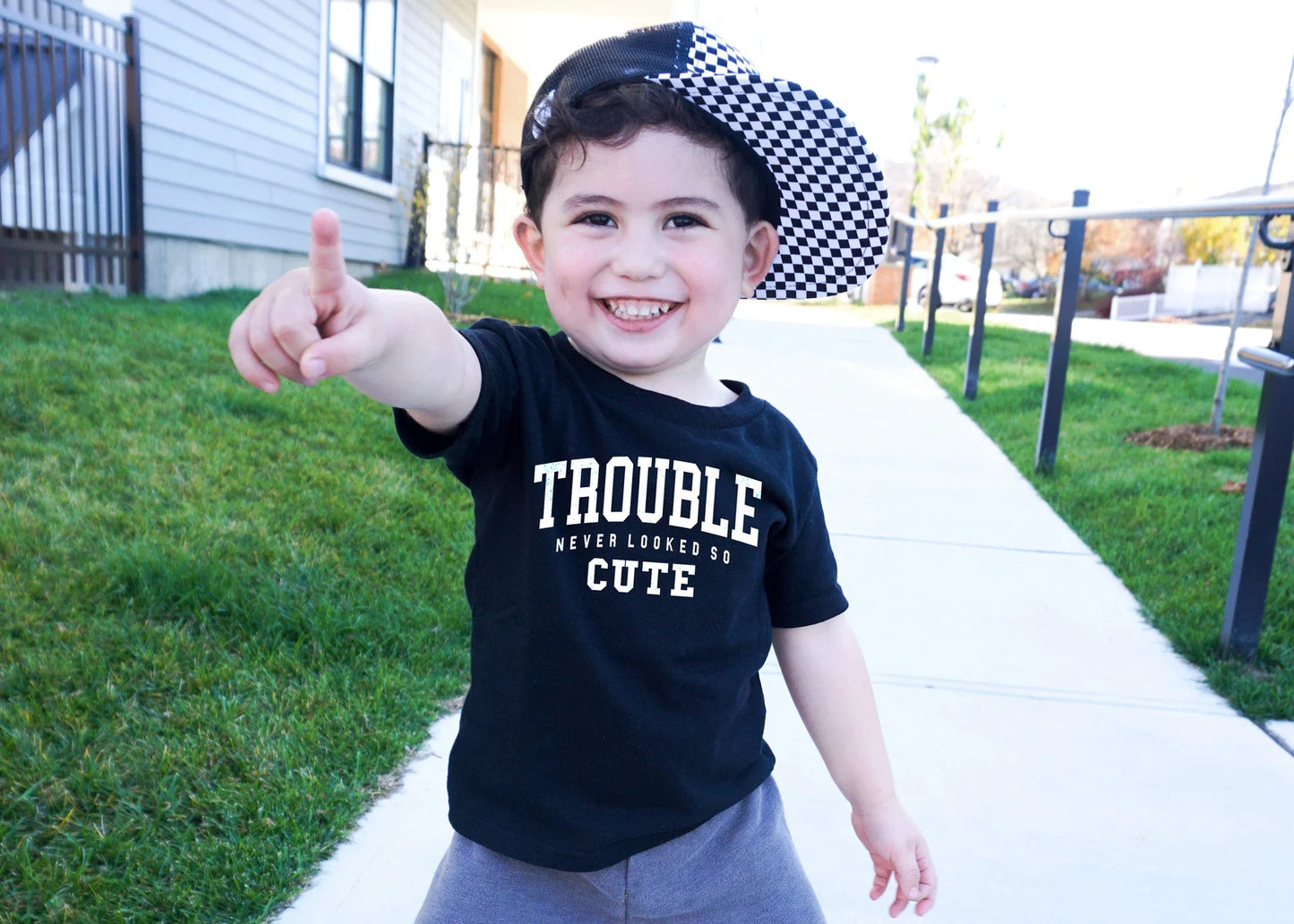 "Trouble Never Looked So Cute"